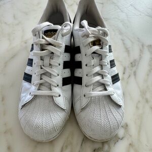 Adidas Superstar, white with black stripes, women’s size 8.5. Worn twice.